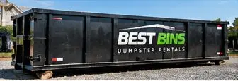 Roll-off container ready for debris at a job site